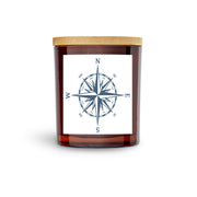 nautical compass scented soy candle.  Cool pirate with tatoo on side of his face.  Amber vessel