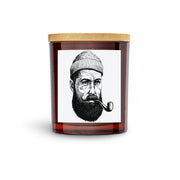 nautical salty sailor pirate scented soy candle.  Cool pirate with tatoo on side of his face.  Amber vessel